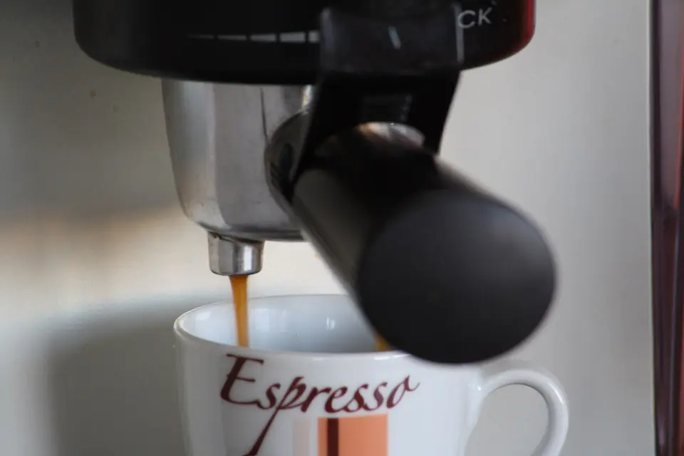 Espresso pouring into a cup